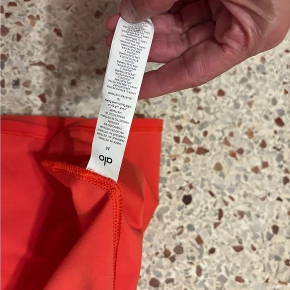 Alo Yoga Women's Alosoft Backspin Skirt in a bright red medium - Picture 9 of 9